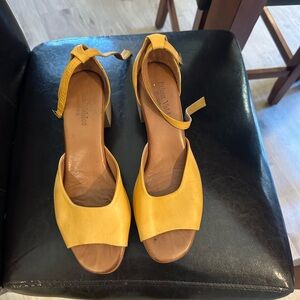 Yellow Sandals with Ankle Straps and Open-Toe Design
